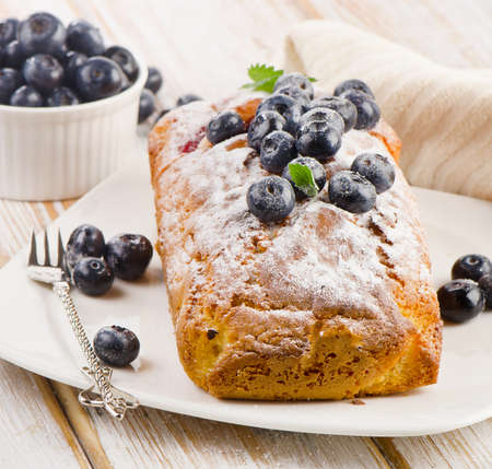 Delicious homemade blueberry cake with fresh blueberries . Selective focusの写真素材