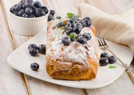 Delicious homemade blueberry cake with fresh blueberries . Selective focusの写真素材