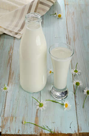 Fresh milk on a wooden table. Selective focusの写真素材