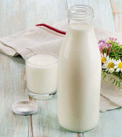 Fresh milk on a wooden table. Selective focusの写真素材