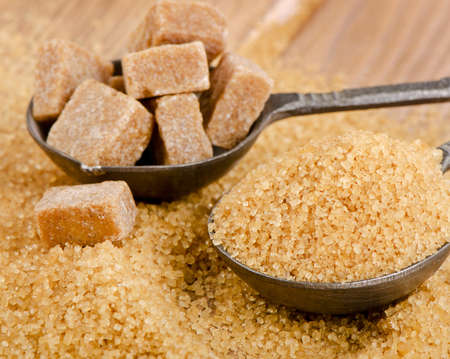 Brown sugar on wooden table. Selective focusの写真素材