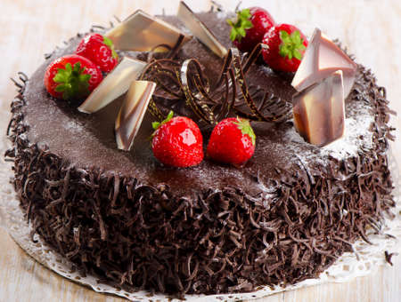 Sweet chocolate cake with strawberries. Selective focusの写真素材