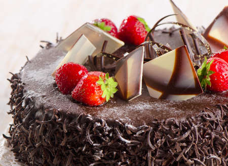 Sweet chocolate cake with strawberries. Selective focusの写真素材