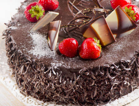 Sweet chocolate cake with strawberries. Selective focusの写真素材