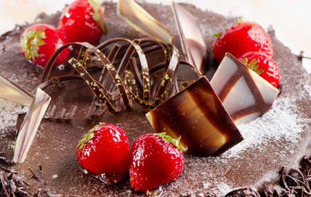 Sweet chocolate cake with strawberries. Selective focusの写真素材