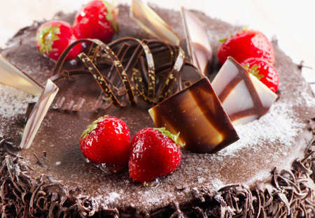Sweet chocolate cake with strawberries. Selective focusの写真素材