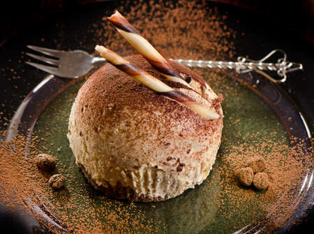 Sweet handmade chocolate cake on a plate. Selective focusの写真素材
