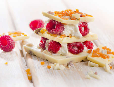 Sweet chocolate christmas tree with berries . Selective focusの写真素材