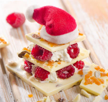 Chocolate christmas tree with Santa hat . Selective focusの写真素材
