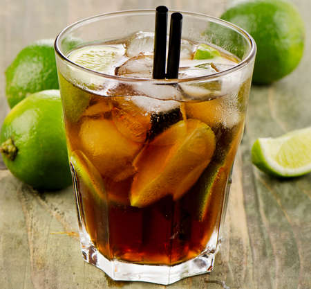 Cocktail with lime on wooden table. Selective focusの写真素材