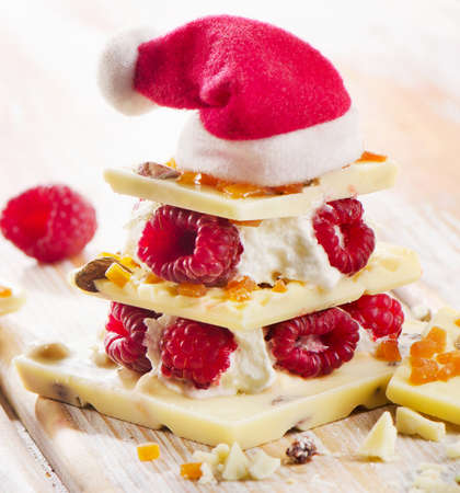Sweet chocolate christmas tree with Santa hat . Selective focusの写真素材