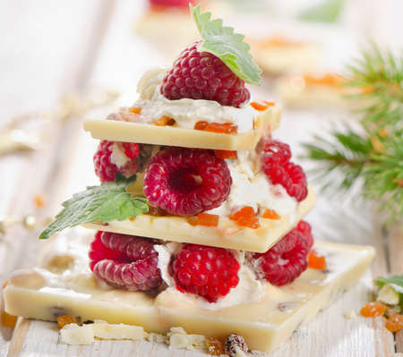 Chocolate christmas tree with fresh berries . Selective focusの写真素材