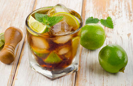 Glass of cocktail with rum, lime, mint  and ice. Selective focusの写真素材
