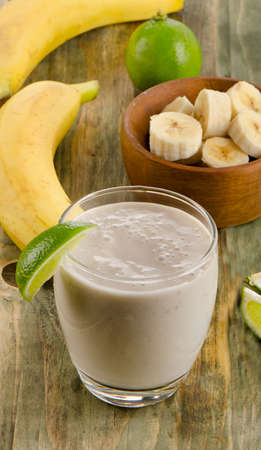 Glasses of   Banana smoothie with lime . Selective focus の写真素材
