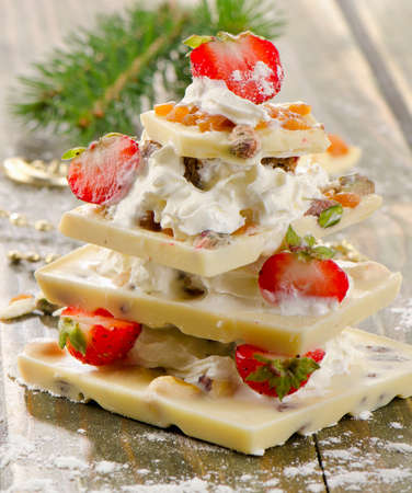 Chocolate sweet christmas tree with strawberries . Selective focusの写真素材