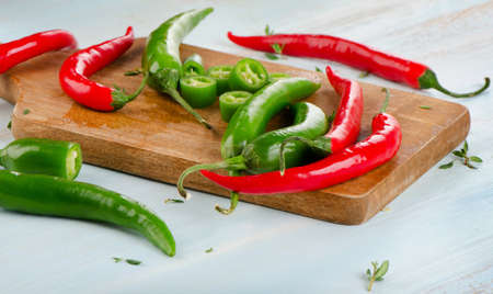 Hot Chili Peppers on  wooden table. Selective focusの写真素材
