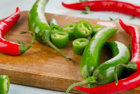 Hot Chili Peppers on a  wooden table. Selective focusの写真素材
