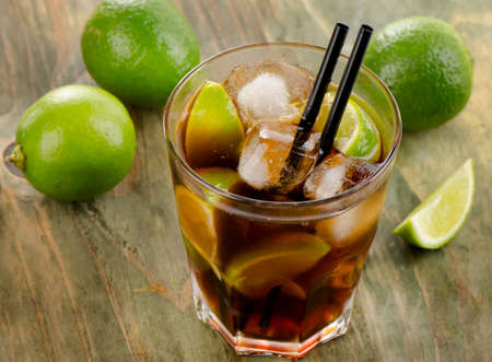 Cuba Libre Drink  on a wooden table. Selective focusの写真素材
