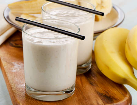 Glasses of healthy  Banana smoothie . Selective focusの写真素材