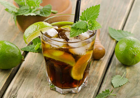 Cocktail with rum, lime, mint  and ice. Selective focusの写真素材