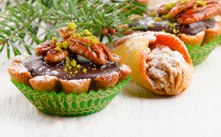 Cupcake with Christmas decoration  on a wooden table. Selective focusの写真素材