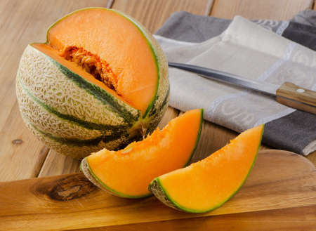 Fresh Melon  on  wooden background. Selective focusの写真素材