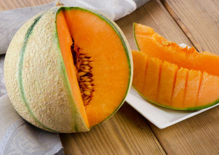 Melon  on  wooden table. Selective focusの写真素材