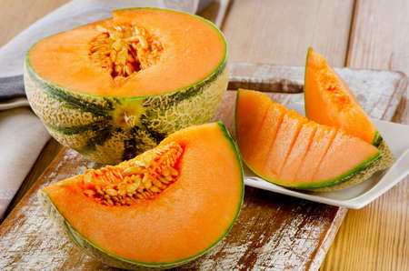 Fresh  melon on  wooden board. Selective focusの写真素材