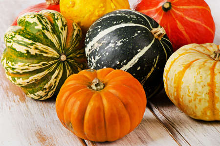 Pumpkins on  wooden background. Selective focusの写真素材