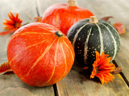 Pumpkins on a wooden table. Selective focusの写真素材