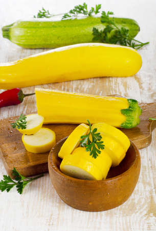 Zucchini on  wooden table. Selective focusの写真素材