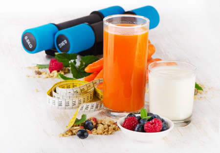dumbbells with   healthy food - health and diet concept. Selective focusの写真素材