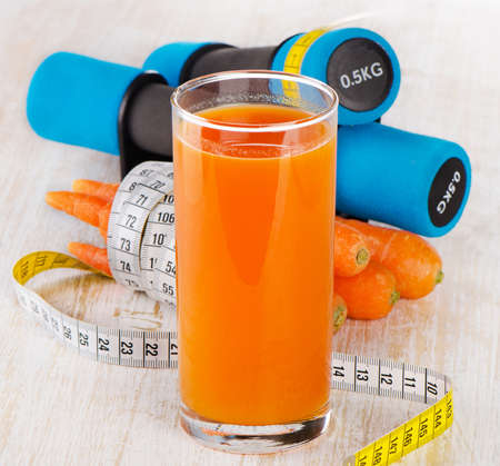 dumbbells and fresh healthy food - health and diet concept. Selective focusの写真素材