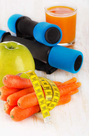 fitness equipment and fresh healthy food - health and diet concept. Selective focusの写真素材