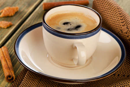 Coffee and cinnamon on a wooden table. Selective focusの写真素材