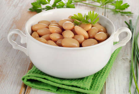 Beans    on a wooden table. Selective focusの写真素材