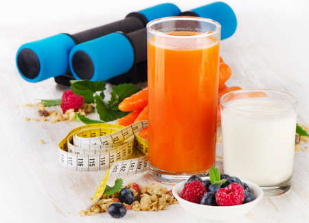 dumbbells with   healthy food . Selective focusの写真素材