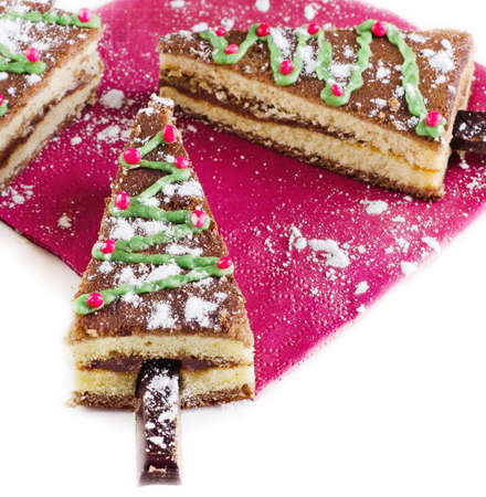 Christmas tree made of sweet cake on isolated on  white  . Selective focusの写真素材