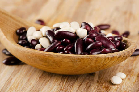 Red and white Kidney beans on  a wooden table . Selective focusの写真素材