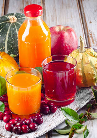 fresh Juices, fruits  and vegetables - autumn still life. Selective focusの写真素材
