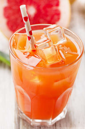 Glass of fresh grapefruit juice. Selective focusの写真素材