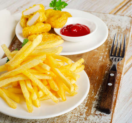 French fries and chicken nuggets   . Selective focusの写真素材