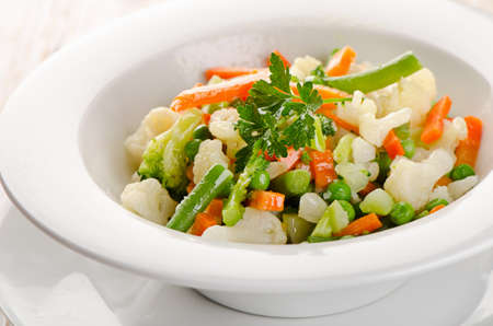 Mixed vegetables in  white  bowl . Selective focusの写真素材