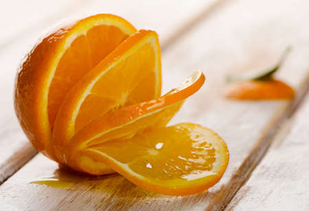 Fresh oranges on a wooden background. Selective focusの写真素材