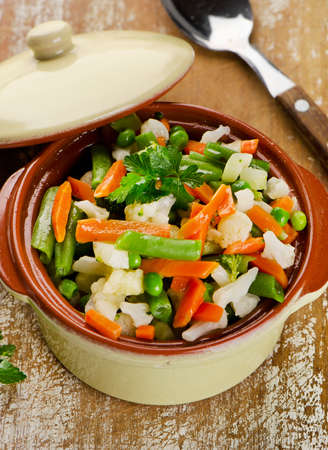 Mixed vegetables in  bowl on  wooden board. Selective focusの写真素材