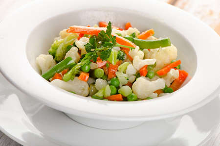 Vegetables in a white  bowl . Selective focusの写真素材