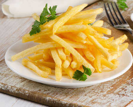 French fries on  wooden board. Selective focusの写真素材