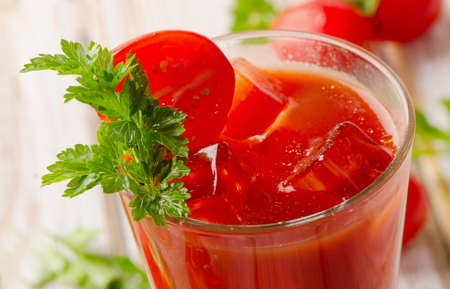 Cocktail  with  fresh  tomatoes and herbs. Selective focusの写真素材