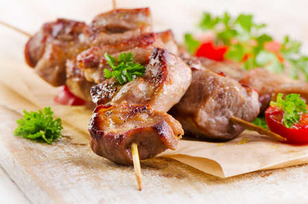 Kebabs served with vegetables. Selective focusの写真素材