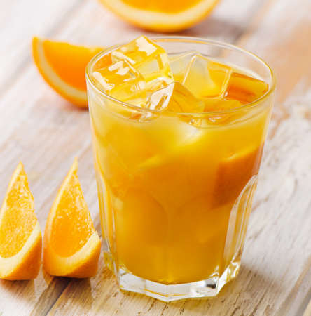 A glass of Orange juice  with ice . Selective focusの写真素材